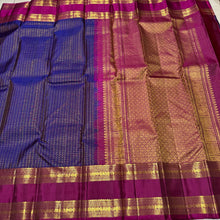 Vaibhogam-Gorgeous Deep Pakku Purplish Blue with Dark Magenta Lakshadeepam Style Handwoven Pure Kanjivaram Silk with rich rettapet borders beautiful pallu and contrast oosi woven blouse
