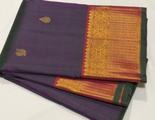 Sahana- Gorgeous Dual tone Manthulir Green with Rustic Orange Handwoven Pure Jari Kanjivaram Silk with beautiful buttas woven body rich mayilkan and chakram woven borders gorgeous pallu and contrast woven blouse