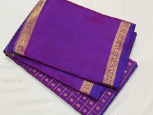 Sahana- Stunning Vadamalli Purple with Gold Handwoven Pure Jari Kanjivaram Silk with Lakshadeepam buttas woven body with rich pallu broad borders and self colored blouse