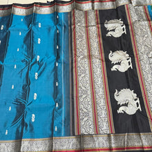 Teal blue with black Premium Handwoven Pure Zariless Kanchipuram Silk with Annapakshi Pallu beauty