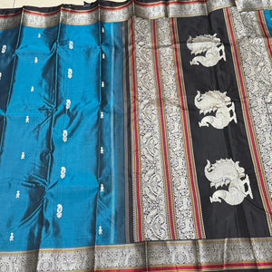 Teal blue with black Premium Handwoven Pure Zariless Kanchipuram Silk with Annapakshi Pallu beauty