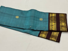 Gorgeous Teal Blue with Coffee Brown Buttas with Rettapet Borders Handwoven Pure Jari Kanjivaram Silk Saree beauty