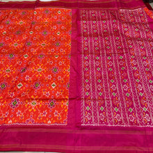 Arabhi- Stunning Orange with Pink in a beautiful Handwoven Premium Zariless Double Ikat Silk with rich woven body gorgeous pallu and contrast woven blouse