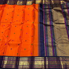 Vaibhogam -Strikingly Beautiful Orange with Deep kanchana Blue Kai Korvai Handwoven Pure Jari with Silk Buttas Pure Kanjivaram Silk with rich Meenakari Work Woven Borders gorgeous pallu and contrast woven blouse