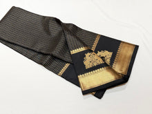 Sahana-Gorgeous Black with Gold Handwoven Pure Kanjivaram Silk with Thematic rettai yazhis and iruthalaipakshis (gandaberundas) motifs woven rich double side borders with beautiful annapakshis and yazhis woven rich pallu and self blouse