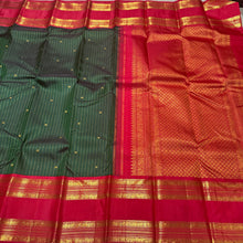 Stunning Bottle Green with Red Handwoven Pure Jari Korvai with Doublepet Rich Borders Gorgeous Pallu and Contrast Woven blouse in a Kai Korvai Handwoven Kanjivaram Silk Saree