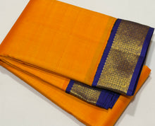 Sarasangi-Gorgeous Mango Orange with Deep Blue Handwoven Jari Korvai Kanjivaram Silk with beautiful borders honey comb design with rich pallu and contrast woven blouse