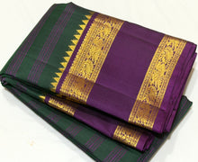 Vaibhogam-Stunning Bottle Green with Purple Handwoven Pure Jari Korvai Kanjivaram Silk with pattu veldhari strips woven beautiful body with rich rettapet borders gorgeous pallu and contrast woven blouse