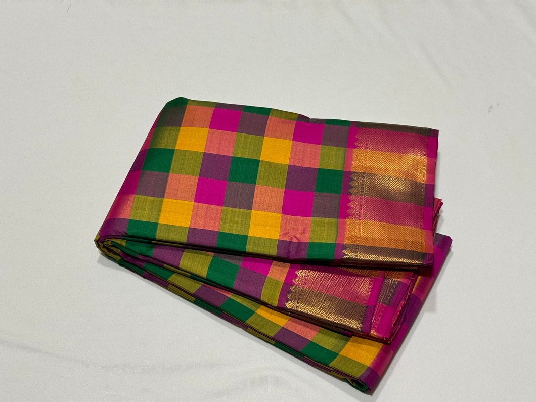 Multicolored Palum Pazhamum Checks with Rani Pink Pallu Blouse in a beautiful Handwoven Pure Jari Kanjivaram Silk Saree