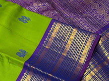 Vaibhogam- Mesmerizing Parrot Green with Violetish Purple Handwoven Pure Jari Korvai Kanjivaram Silk with Pattu buttas woven body with rich borders gorgeous pallu and contrast woven blouse