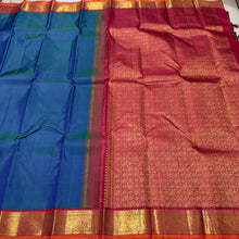 Sarasangi- Gorgeous Peacock Blue with Arakku Red Handwoven Pure Jari Korvai Kanjivaram Silk with beautiful borders with orange selvedges rich pallu and contrast woven blouse