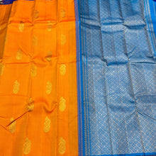 Mango Orange with Blue Handwoven Pure Jari Borderless Kanchipuram Silk Saree with Muthukattam and Buttas