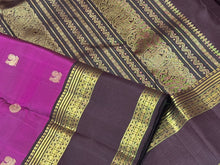 Gorgeous Deep Magenta with Coffee Brown Handwoven Pure Jari Kanjivaram Silk with rich buttas woven body beautifully woven borders pallu with meenakari weave and contrast woven blouse