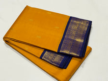 Vaibhogam- Stunning Mustard with MS Blue Buttas Handwoven Pure Jari Korvai Kanjivaram Silk with beautiful borders rich pallu and contrast woven blue blouse beauty