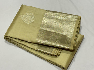 Pastel Green Tinted Cream with Silver Jari Buttas Handwoven Pure Kanjivaram Silk Saree with rich borders pallu and self colored blouse beauty