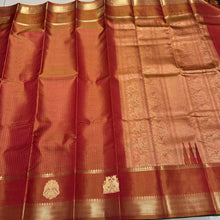 Vintage Weave-Rustic Orange with Jari Oosi Kattam and Gandaberunda and Yazhi motifs woven Borders in a Handwoven Pure Jari Kanjivaram Silk Saree Beauty
