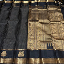 Sahana-Gorgeous Black with Gold Handwoven Pure Kanjivaram Silk with Thematic rettai yazhis and iruthalaipakshis (gandaberundas) motifs woven rich double side borders with beautiful annapakshis and yazhis woven rich pallu and self blouse