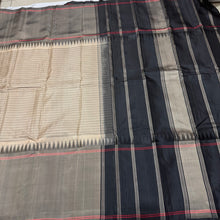 Gorgeous Handwoven Pure Zariless Korvai Kanjivaram Silk Saree in ivory with grey and black combination with temples woven long borders striped body classic seer pallu in black and contrast black blouse