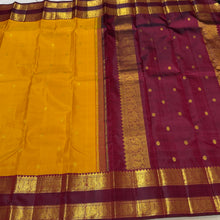 Vaibhogam- Gorgeous Mustard with Deep Maroon Buttas Handwoven Pure Jari Korvai Kanjivaram Silk with Doublepet borders rich pallu and contrast woven blouse
