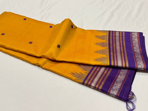 Yellow with Purple Buttas Handwoven Pure Zariless Korvai with temple borders Zariless Kanjivaram Silk Saree Beauty