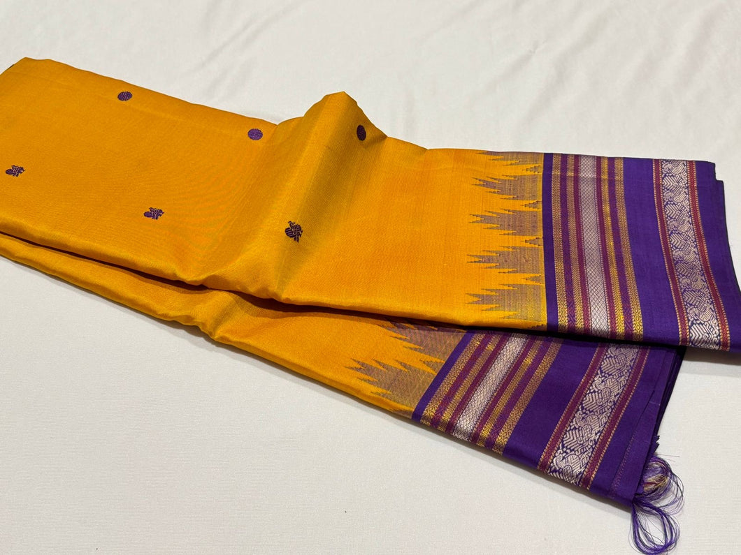 Yellow with Purple Buttas Handwoven Pure Zariless Korvai with temple borders Zariless Kanjivaram Silk Saree Beauty