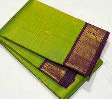 Vaibhogam-Beautiful Parrot Green with Deep Purple Handwoven Pure 2g Jari Korvai with Small Bird Buttas woven Kanjivaram Silk with rich borders gorgeous pallu and contrast woven blouse