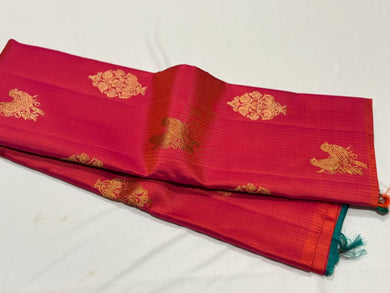 Dual tone Orange Tomato Pink with Peacock Blue Borderless Muthukattam with Double Parrot & Floral Motifs with rich parrots woven pallu and contrast blouse in Handwoven Pure Jari Kanjivaram Silk Saree Beauty