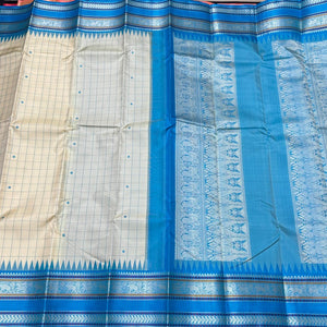 Offwhite with Copper Sulphate Blue Muthukattam with Buttas Handwoven Pure Zariless Korvai temple borders Kanjivaram Silk Saree Beauty