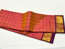 Double tone Orange mixed with deep magenta  Handwoven Pure Jari muthukattam woven Kanjivaram with rich borders pallu and contrast woven blouse beauty