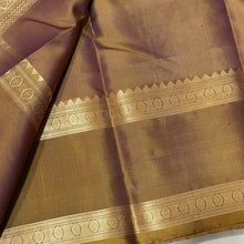 Sahana- Gorgeous Lavendar with Bronze Gold Combo in a Handwoven Pure Jari Kanjivaram Silk with elephants annapakshis and deer motits woven all over the body with beautiful rudrakshas woven rettapet borders with gorgeous pallu and contrast woven blouse
