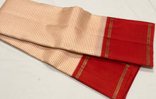 Sarasangi- Stunning Offwhite with Burnt Orange Checked Handwoven Pure Jari Korvai Kanjivaram Silk with beautiful doublepet borders rich pallu and contrast woven blouse