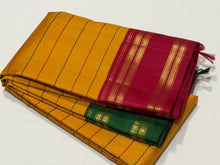 Vaibhogam- Mesmerizing Mustard with Ganga Jamuna Handwoven Pure Jari Korvai Kanjivaram Silk with neliveldhari woven beautiful body with rettapet borders rich seepu rekku pallu in arakku with contrast arakku blouse