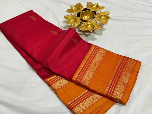 Red with Golden Mustard Buttas with Continuous Thodar Elephant  Motifs Pallu and Doublepet Borders Beauty
