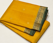 Sahana- Gorgeous Golden Yellow with Dual tone Green Buttas Handwoven Pure Kanjivaram Silk with small beautiful borders rich pallu and contrast woven blouse