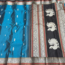 Teal blue with black Premium Handwoven Pure Zariless Kanchipuram Silk with Annapakshi Pallu beauty