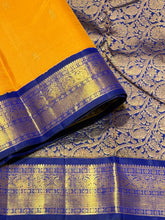 Vaibhogam- Stunning Mustard with MS Blue Buttas Handwoven Pure Jari Korvai Kanjivaram Silk with beautiful borders rich pallu and contrast woven blue blouse beauty