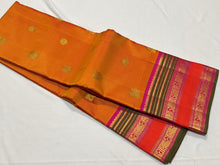 Sahana- Super Gorgeous Beautiful Simha Color (dual tone orange shot mustard shade) with Rich Pink Handwoven Pure Kanjivaram Silk with Mayil Chakram Buttas woven body with beautiful borders rich pallu and contrast woven blouse