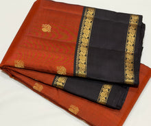 Sahana- Stunning Rust with Black Buttas Handwoven Pure Kanjivaram Silk with beautiful buttas woven body with doublepet borders rich buttas woven pallu and contrast woven blouse