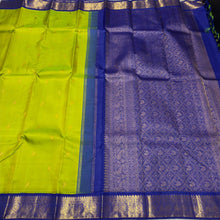Vaibhogam- Stunning Parrot Green with MS Blue Handwoven Pure Jari Korvai Kanjivaram Silk with Bird buttas woven body with rich borders pallu and contrast woven blouse