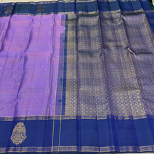 Sahana- Gorgeous December Poo Lavendar with Deep Peacock Blue Handwoven Pure Jari checked kanjivaram silk with buttas in the body with beautiful Gandaberundas woven either side borders rich pallu and contrast Jari striped blouse