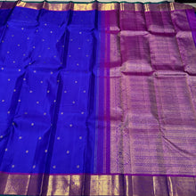 Royal Blue with Purple Buttas Handwoven Pure Jari Kanjivaram Silk Saree with rich buttas woven body , intricate mayil chakram buttas woven borders, gorgeous pallu and contrast woven blouse