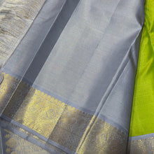 Vaibhogam- Gorgeous Parrot Green with Grey Handwoven Pure 2g Jari Korvai with Vairaoosi woven body with Buttas in a Kanjivaram Silk with rich borders gorgeous pallu and contrast woven grey vairaoosi blouse