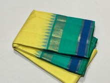 Sarasangi- Stunning Lemon Yellow with Aqua Green Blue Shade with Temple Spaced Borders Handwoven Pure Jari Korvai Kanjivaram Silk with rich seer pallu and contrast woven blouse. A super gorgeous piece for this wedding and festival season