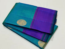 Gorgeous Dual tone Peacock Blue Green with Purple Handwoven pure Jari Kanjivaram Silk Saree with Horse motifs woven body plain beautiful borders rich mayil chakram buttas woven pallu and contrast woven blouse
