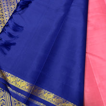 Sarasangi- Gorgeous Peachish Pink with Blue Handwoven Pure Jari Korvai Kanjivaram Silk with Oru kunjam Pillayar moggu with body buttas woven rich meena buttas woven pallu and contrast woven blouse