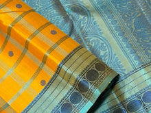 Gorgeous Golden Mustard with Turquoise Blue and Peacock Blue Handwoven Pure Zariless 1000 buttas style woven beautiful Kanjivaram Silk with rich borders pallu and contrast woven blouse