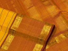 Mustard with Ganga Jamuna Borders with Dual tone Orange mustard Pallu and blouse in a beautiful Neli Veldhari Handwoven Pure Jari Kanjivaram Silk Saree beauty