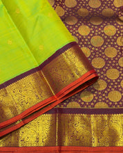 Vaibhogam-Gorgeous Sneha Green with Deep Maroonish Brown Handwoven Pure Jari Korvai Kanjivaram Silk with beautiful kolam buttas woven body with rich borders with orange selvedes gorgeous pallu with polka dots woven and contrast woven blouse
