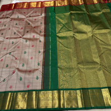 Vaibhogam-Gorgeous Beige Abirami with Ganga Jamuna borders Striped body with silk thread buttas with rich bottle green rich and beautifully wovwn pallu and contrast woven blouse
