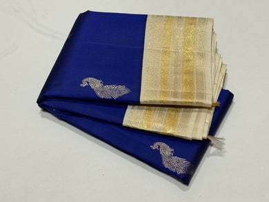 Vintage Inspired- Stunning Royal Blue with Ivory White With Peacock Body Silver Jari Buttas with rich varisaipet borders Handwoven Kaikorvai Kanjivaram Silk Saree with Rich Pallu and Contrast woven blouse beauty